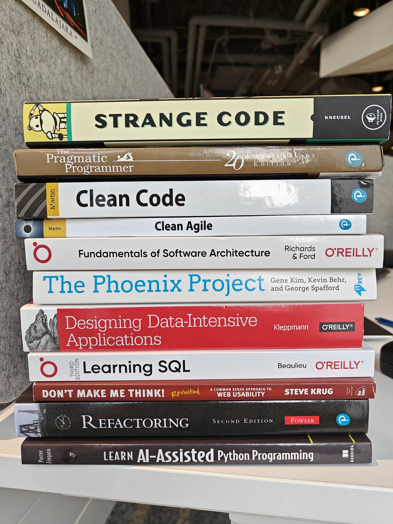 A stack of books recommended for software developers.